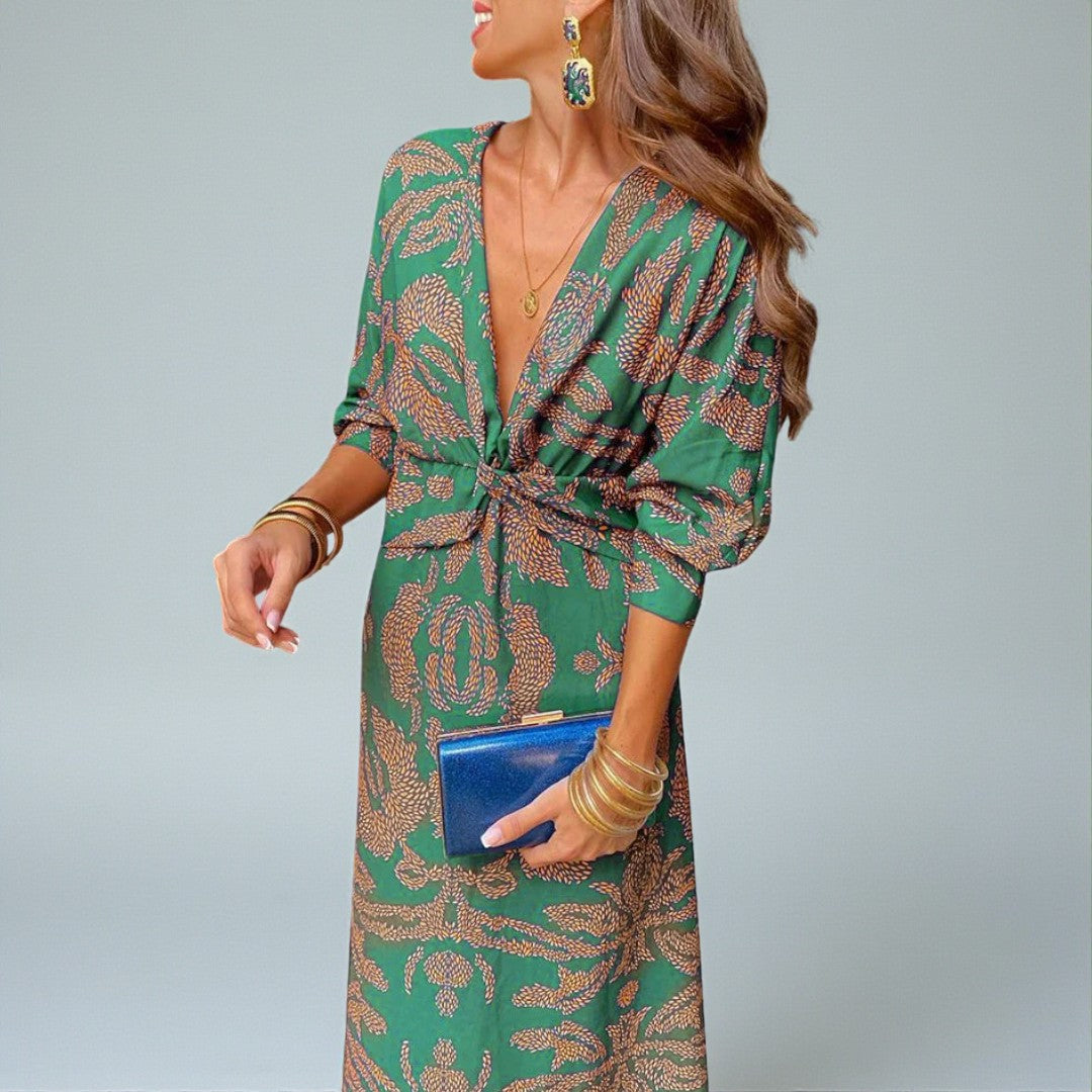 Damska wieczorowa sukienka midi z kopertową linią