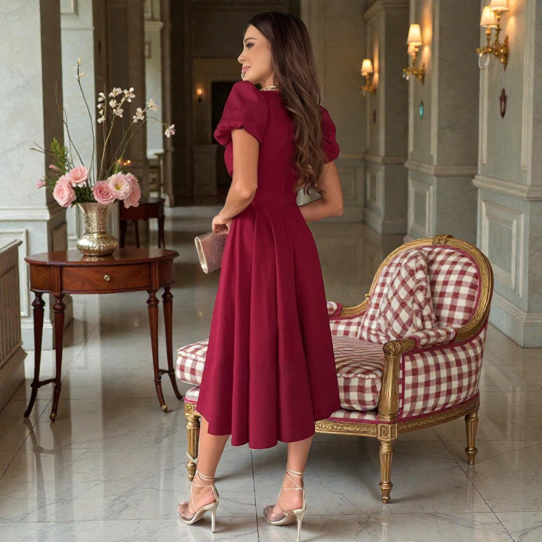 Damska midi sukienka z marszczoną górą i rękawami bufkami