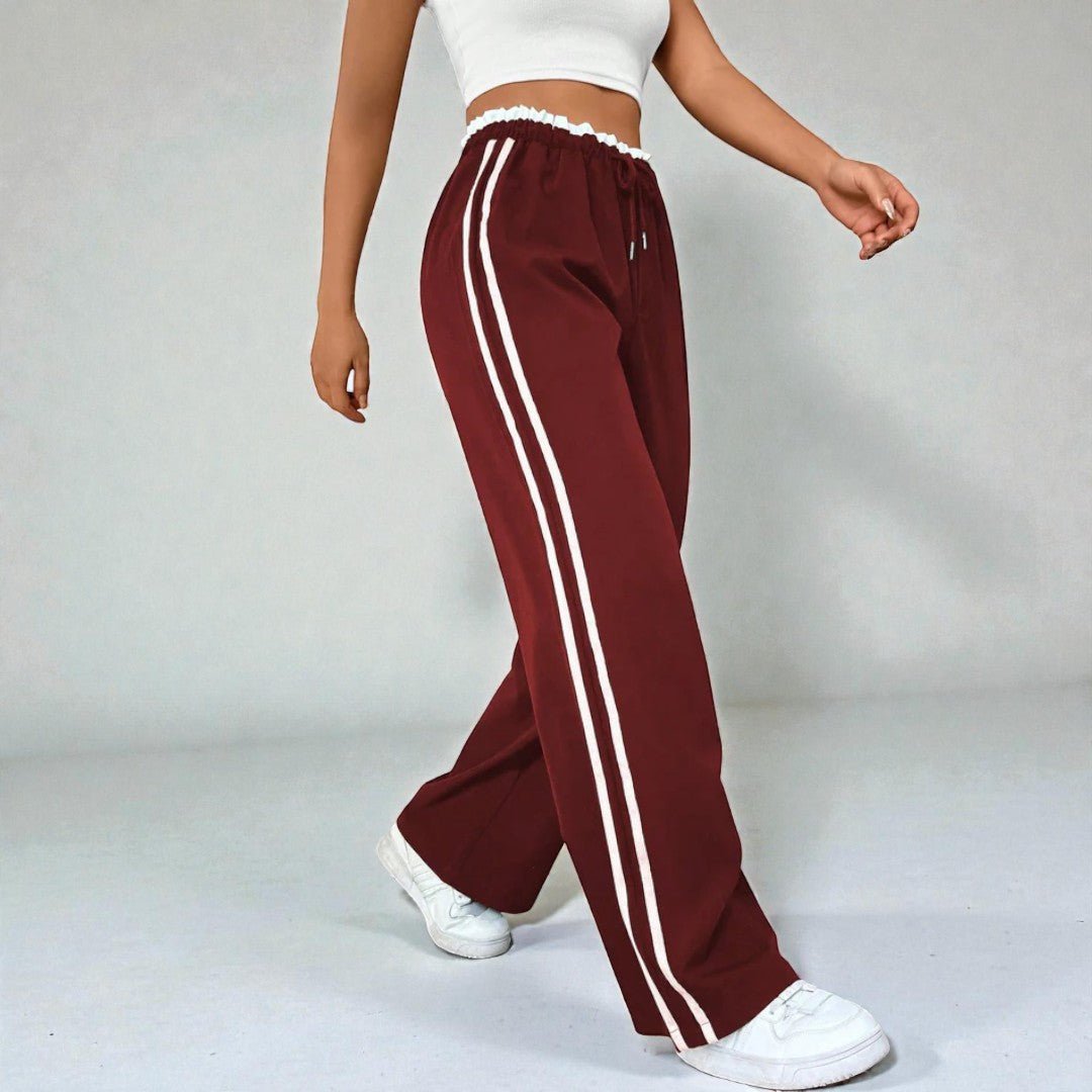 Damskie spodnie dresowe z prostą nogawką i podwójnymi lampasami - Bordowy