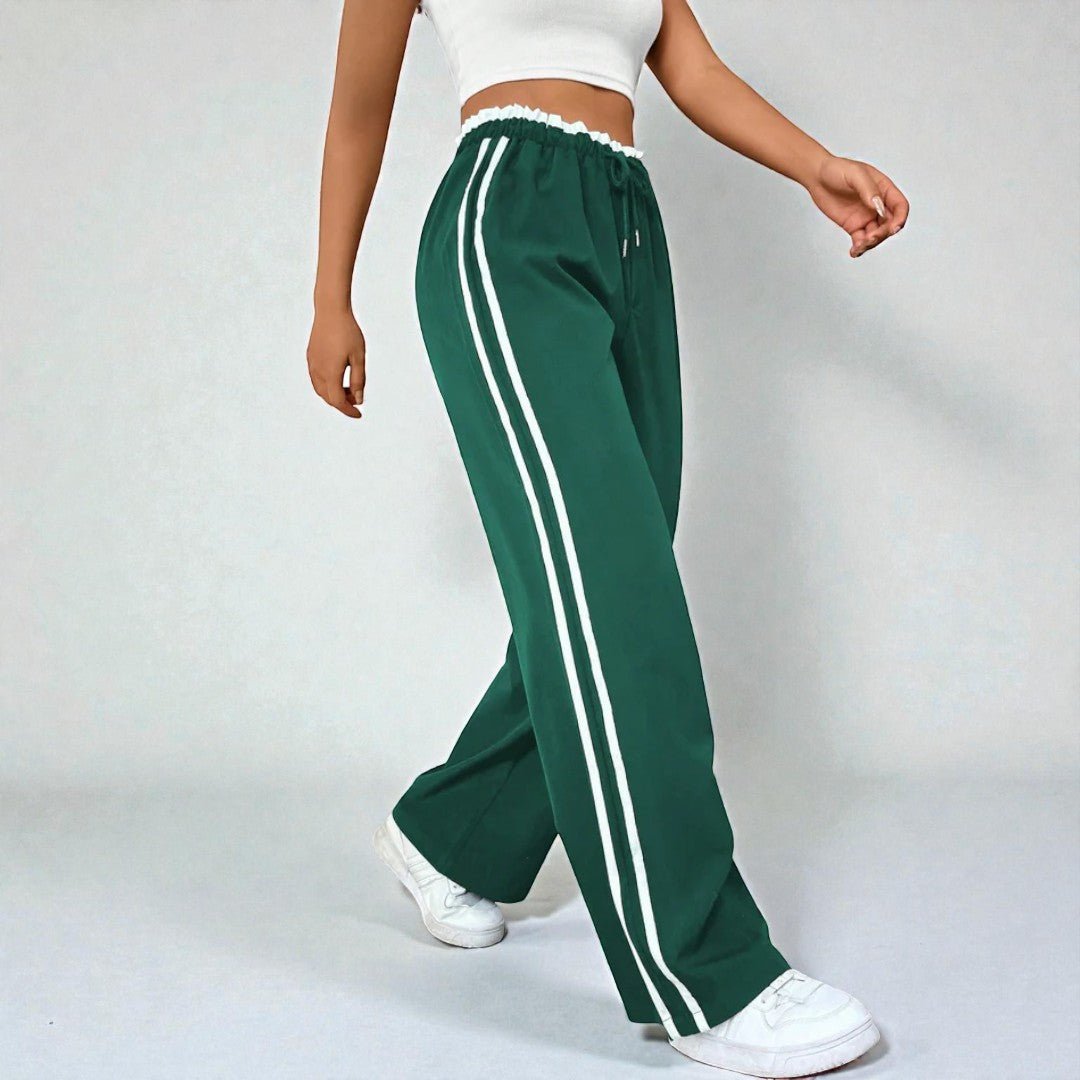 Damskie spodnie dresowe z prostą nogawką i podwójnymi lampasami - Zielony