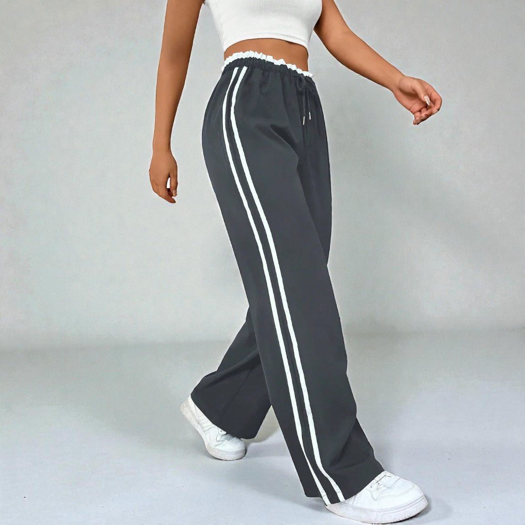 Damskie spodnie dresowe z prostą nogawką i podwójnymi lampasami - Szary