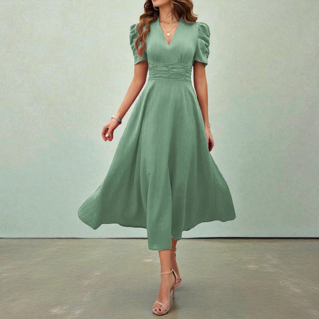 Damska świąteczna sukienka midi o dopracowanym kroju