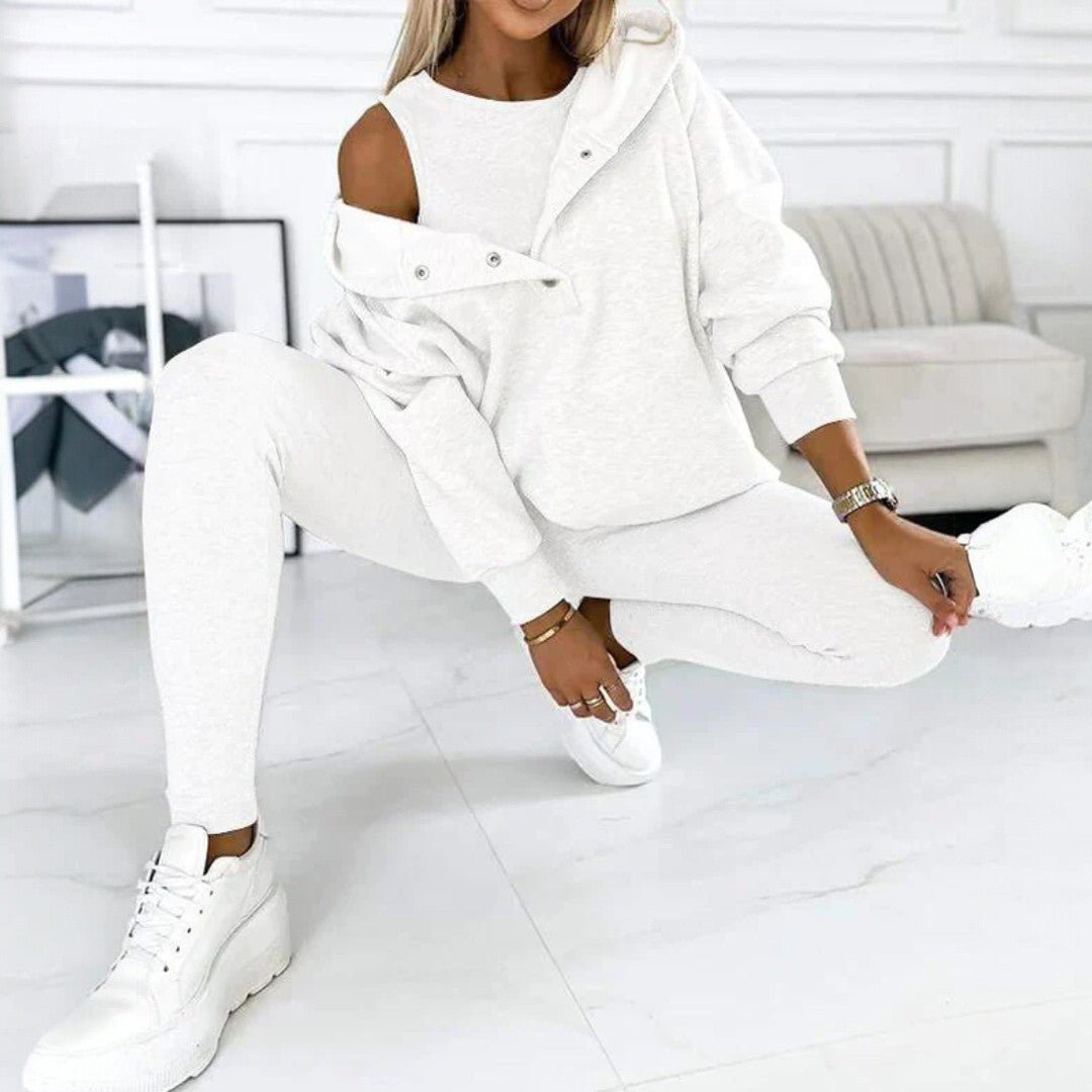 Trzyczęściowy zestaw damski z asymetrycznym swetrem, topem i legginsami - Różowy