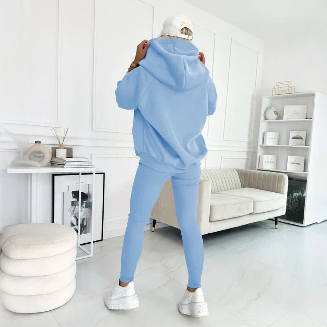 Trzyczęściowy zestaw damski z asymetrycznym swetrem, topem i legginsami - Różowy